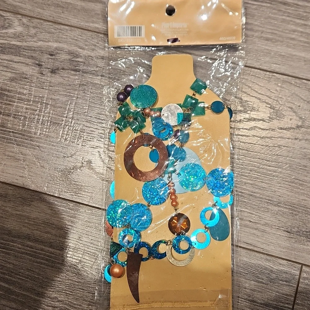 NWT Pier 1 Imports Bottle Cover
